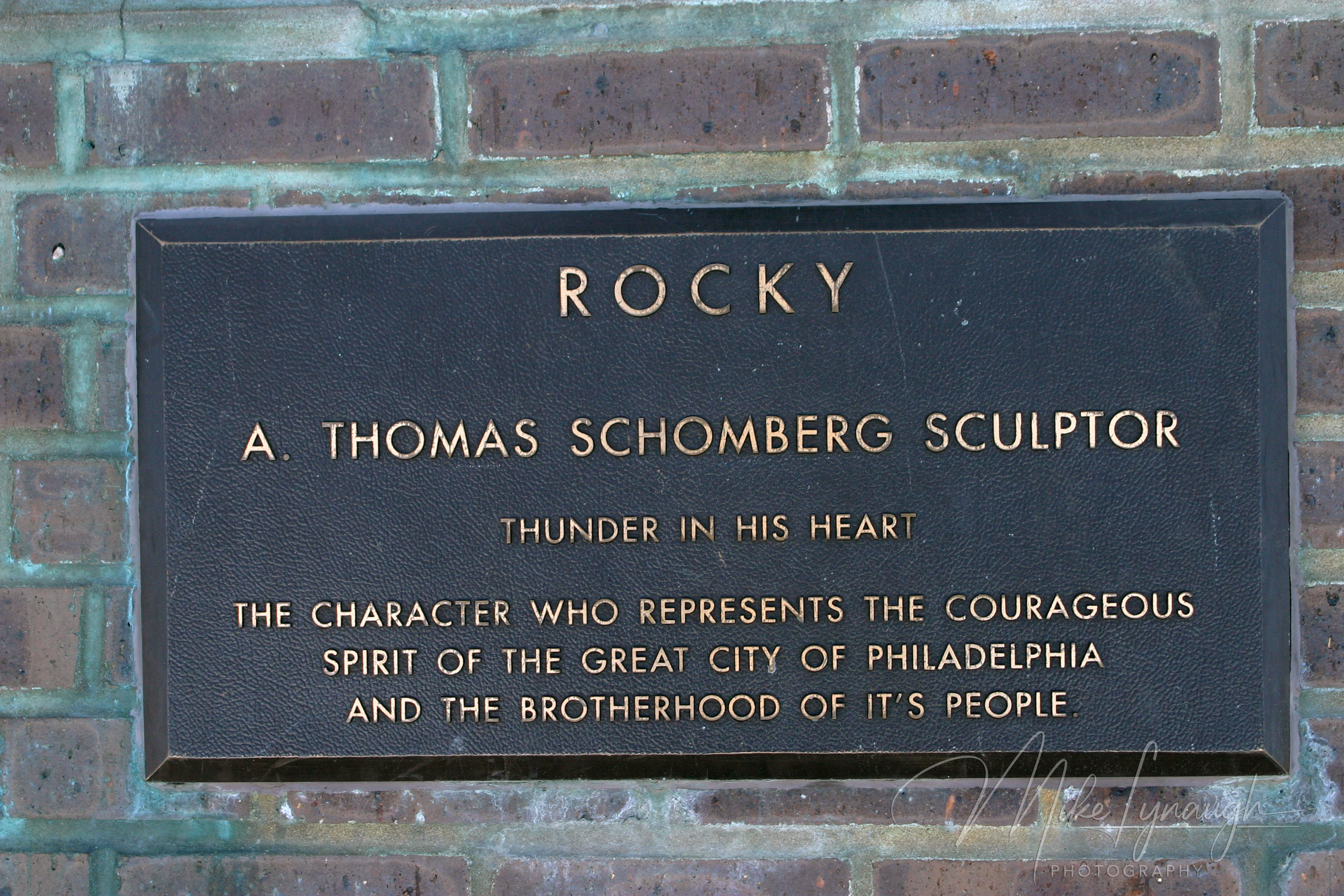 Detail photo of the plaque by artist A. Thomas Schomberg on the base of the Rocky statue when it was in front of the Philadelphia Spectrum arena in 2005.