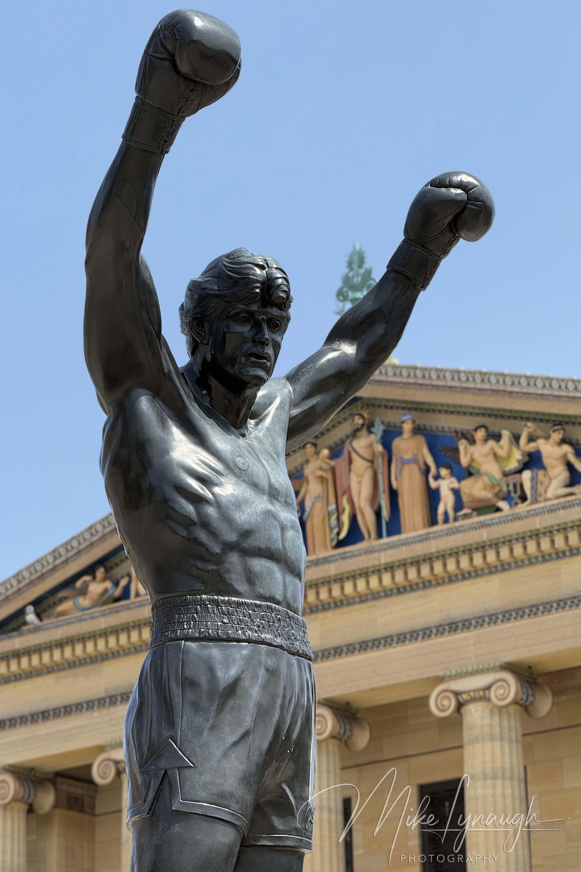 Looking up at the Rocky Statue at the top of the Rocky Steps at the Philadelphia Museum of Art.