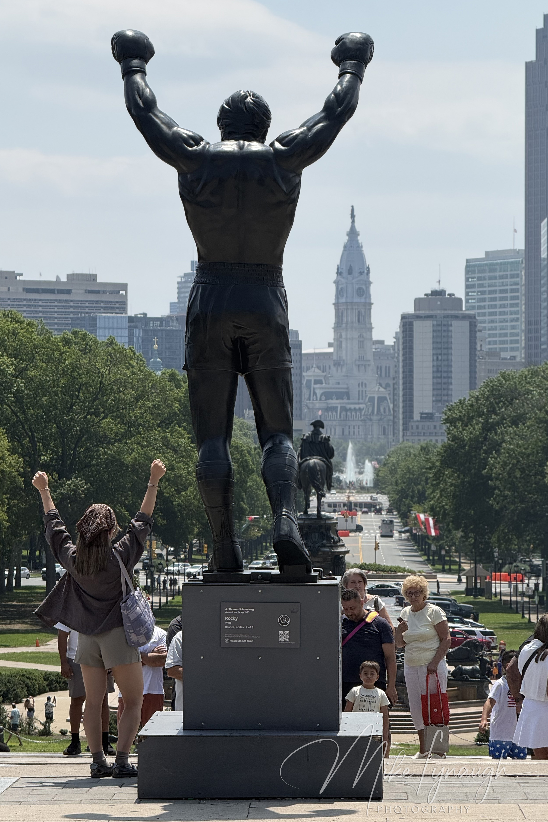 Rocky Statue — Posing with Rocky. Visitors strike the iconic Rocky pose at the Rocky statue.