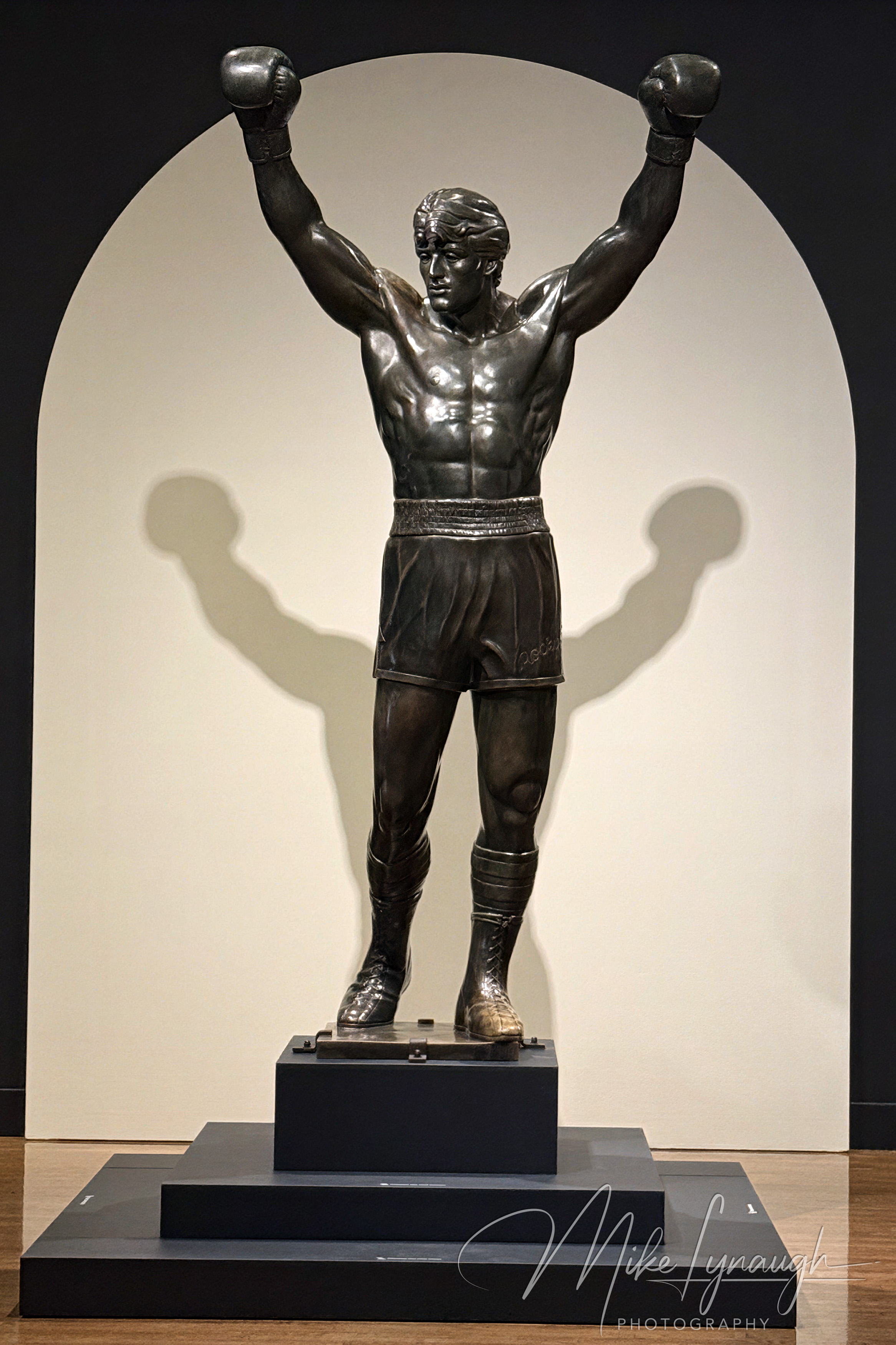 Rocky Statue — Rising Up Exhibition. Sylvester Stallone's personal Rocky Statue on display inside the Philadelphia Museum of Art for the first time ever in the special exhibit "Rising Up".