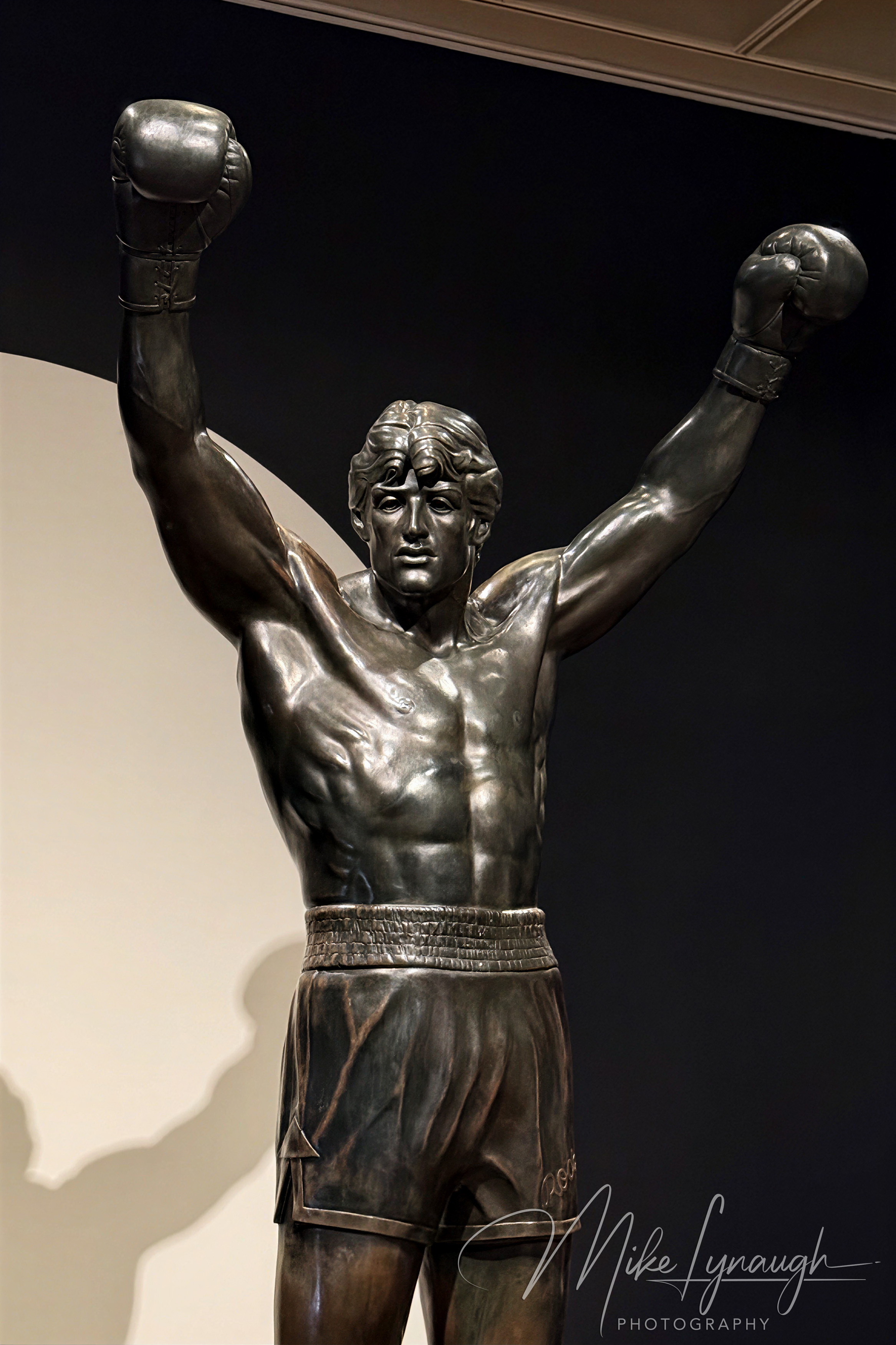 Rocky Statue — Rising Up Exhibition. Sylvester Stallone's personal Rocky Statue on display inside the Philadelphia Museum of Art for the first time ever in the special exhibit "Rising Up".
