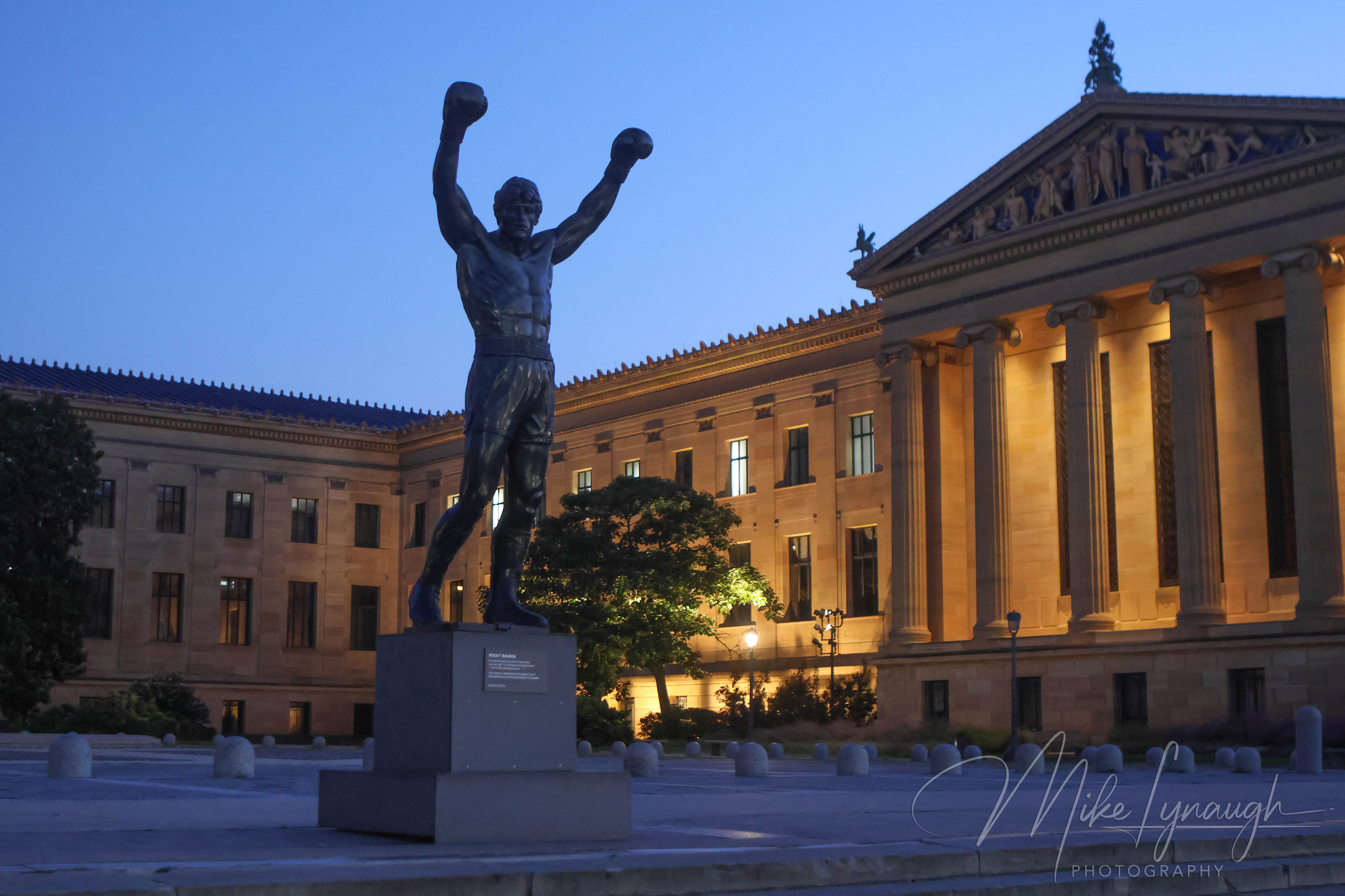 Sylvester Stallone's personal Rocky Statue sits atop of the iconic Rocky Steps as the first rays of morning light begin to illuminate the statue and Philadelphia Museum of Art.