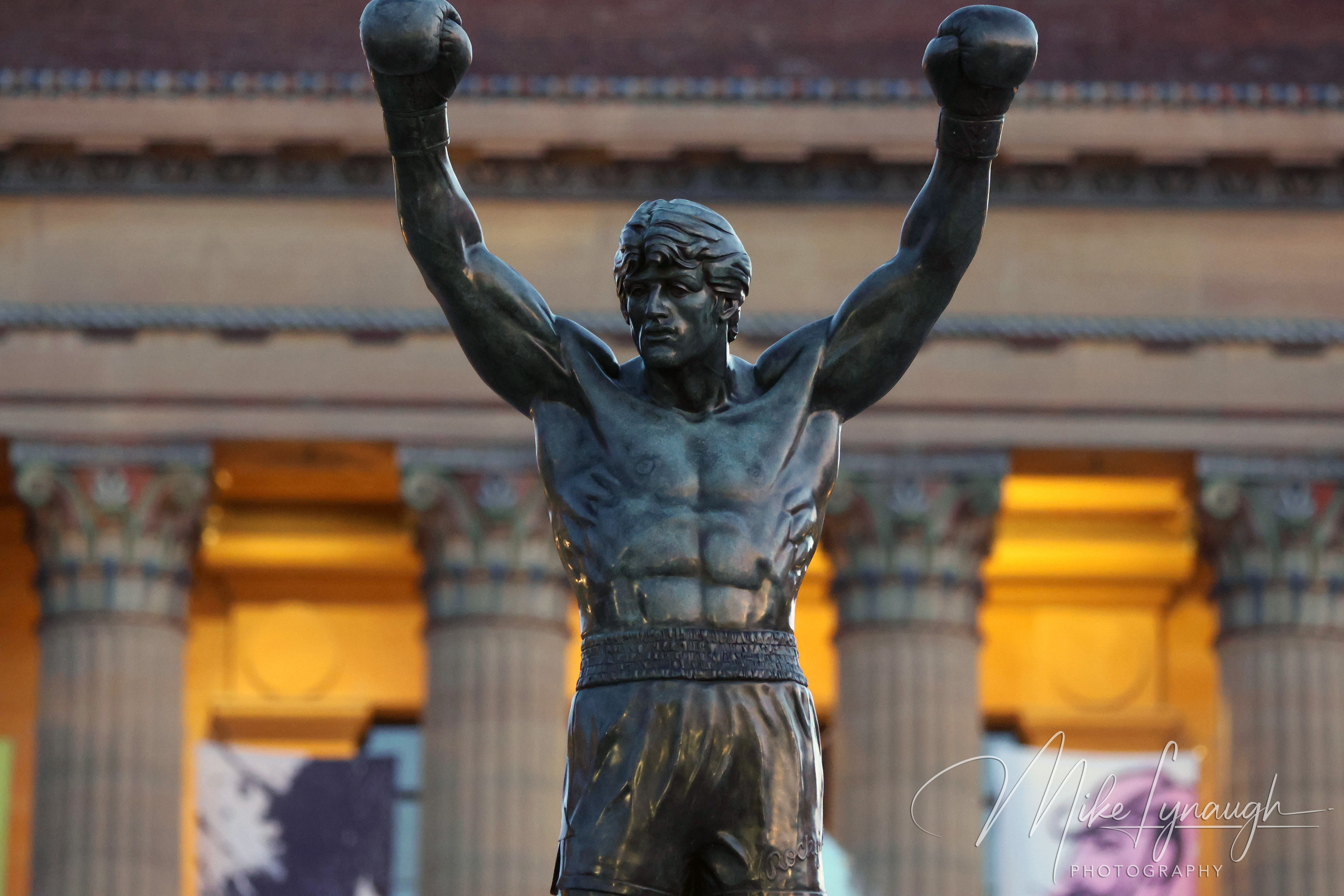 The first rays of sunlight illuminate the Rocky statue outside the Philadelphia Museum of Art, one of my favorite times to photograph the monument because of the warm morning light.