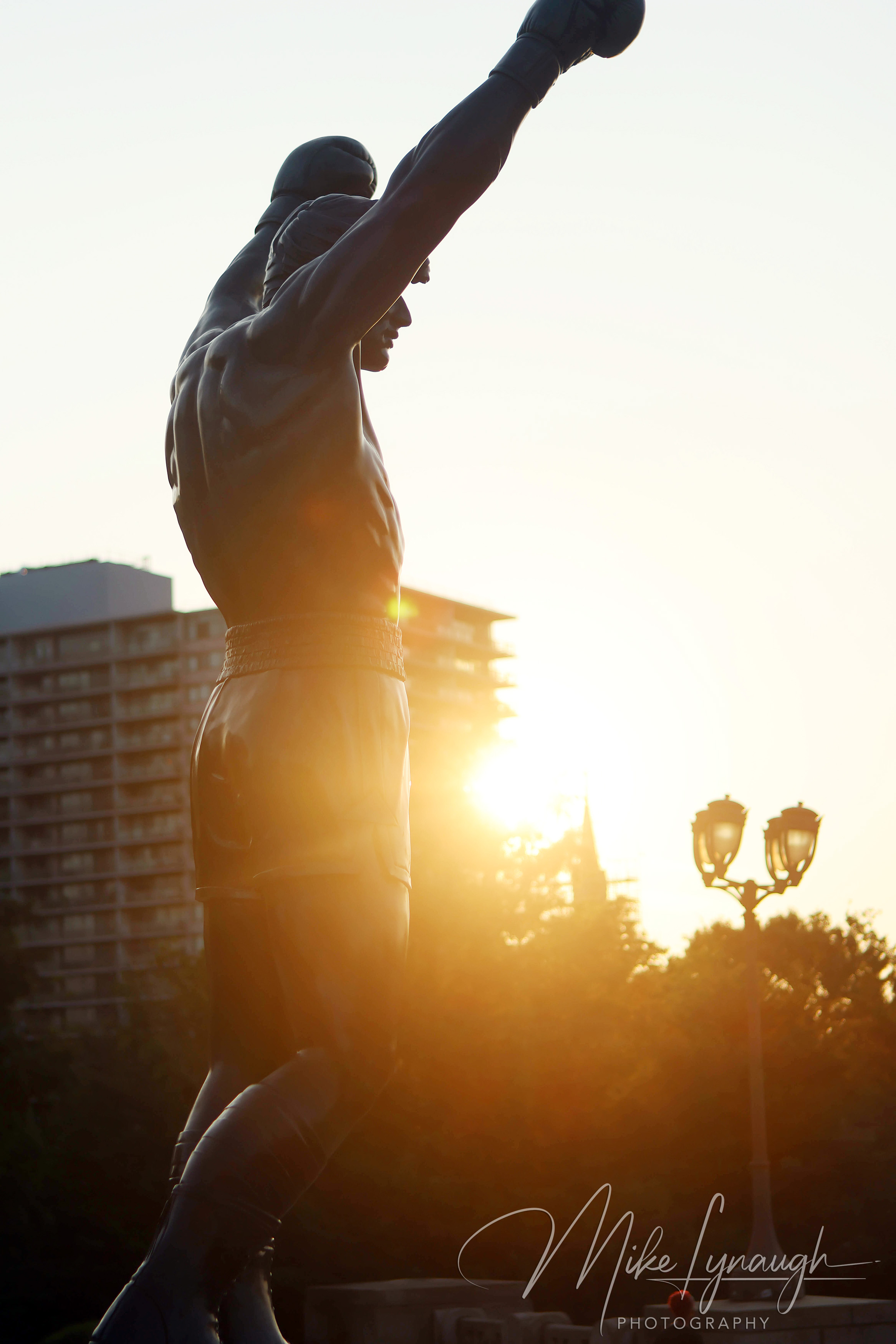 Rocky Statue — Sunrise illuminates the Rocky Statue at the top of the Rocky Steps. The first rays of sunlight illuminate the Rocky statue outside the Philadelphia Museum of Art, one of my favorite times to photograph the.