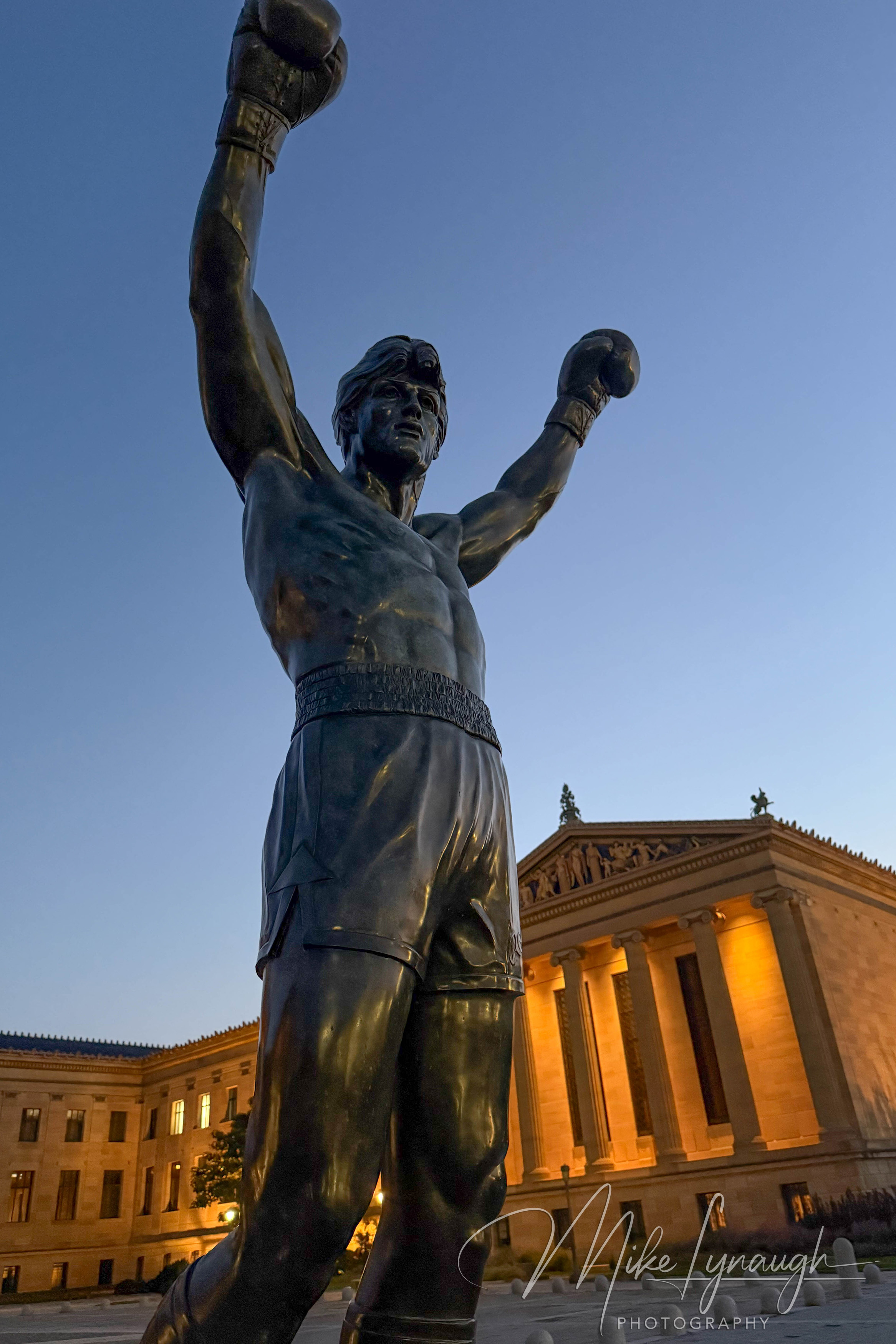 Looking up at the Rocky Statue at the top of the Rocky Steps at the Philadelphia Museum of Art.