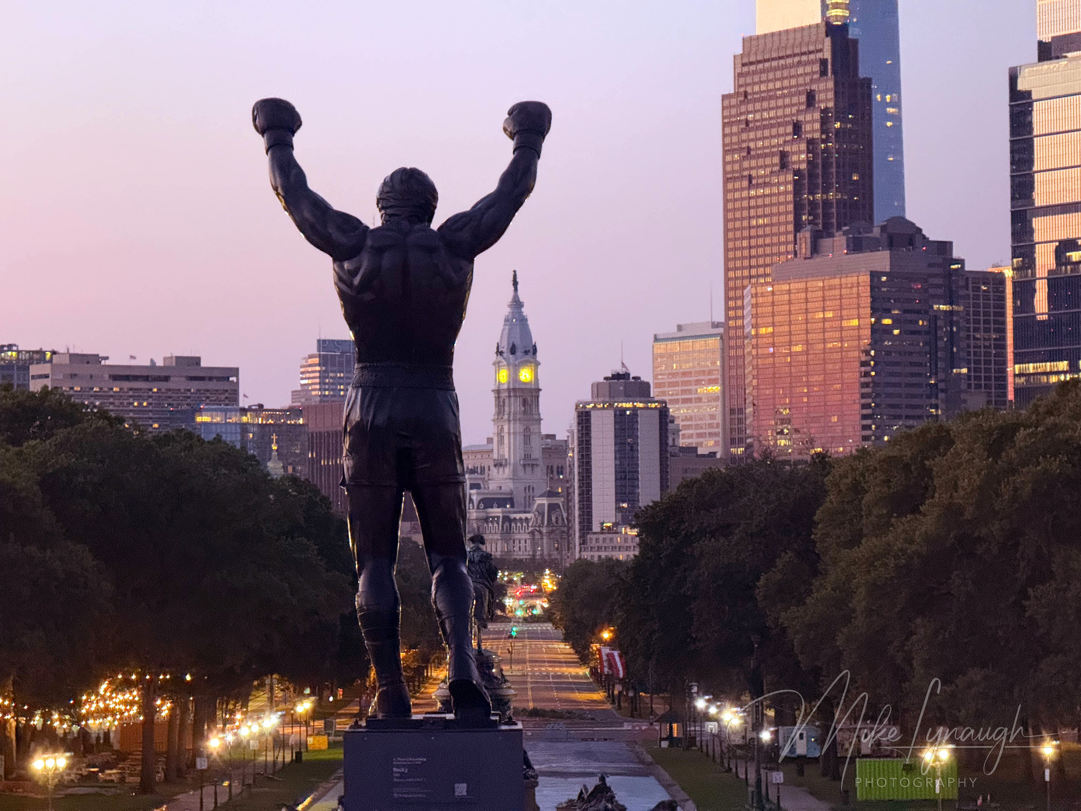 Rocky Statue — Overlooking the Philadelphia Skyline at sunrise. Sylvester Stallone's personal Rocky Statue overlooks the Philadelphia skyline as the morning light begins to illuminate the city.