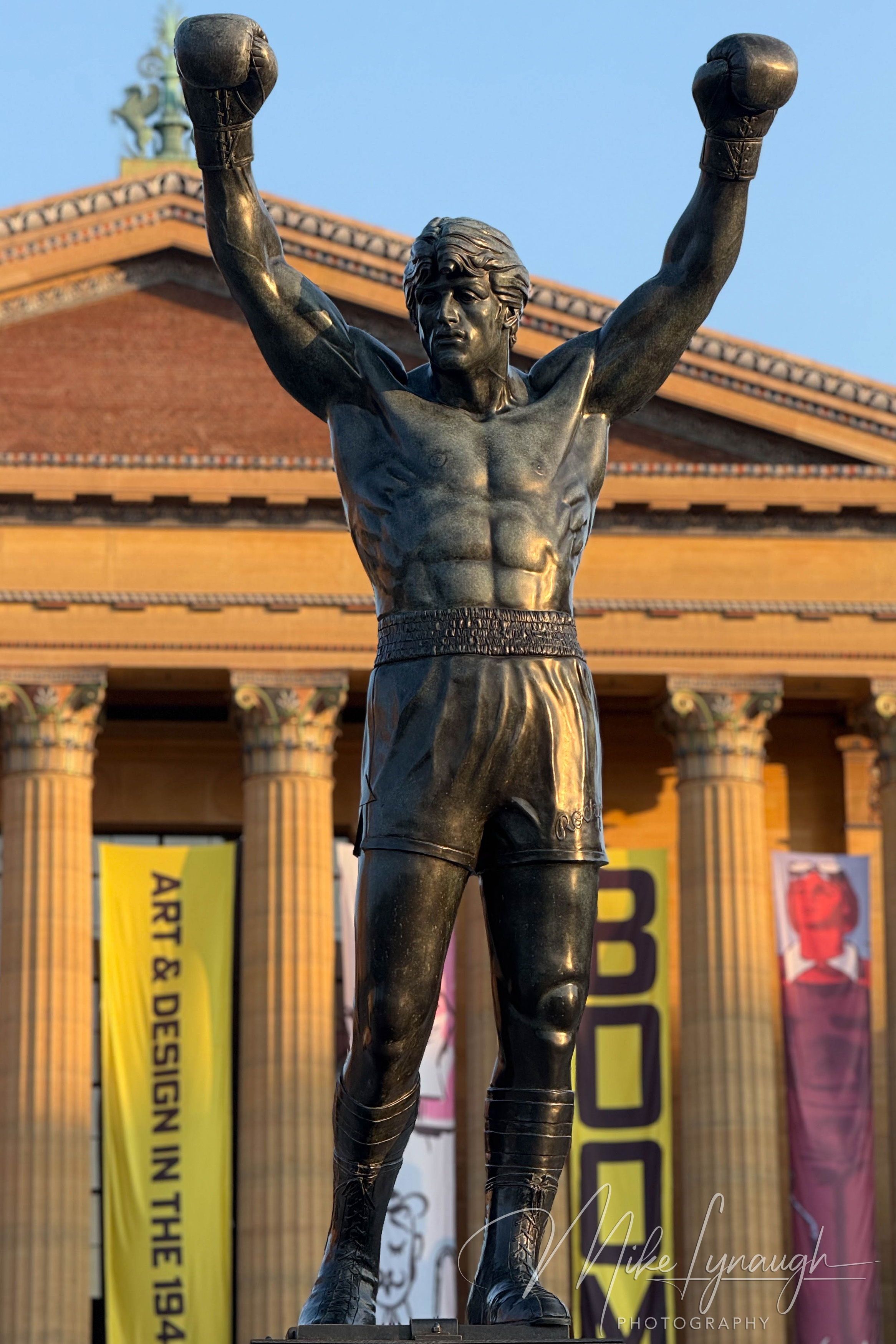 Rocky Statue — Detailed Close up view at sunrise. The first rays of sunlight illuminate the Rocky statue outside the Philadelphia Museum of Art, one of my favorite times to photograph the monument because of the warm.
