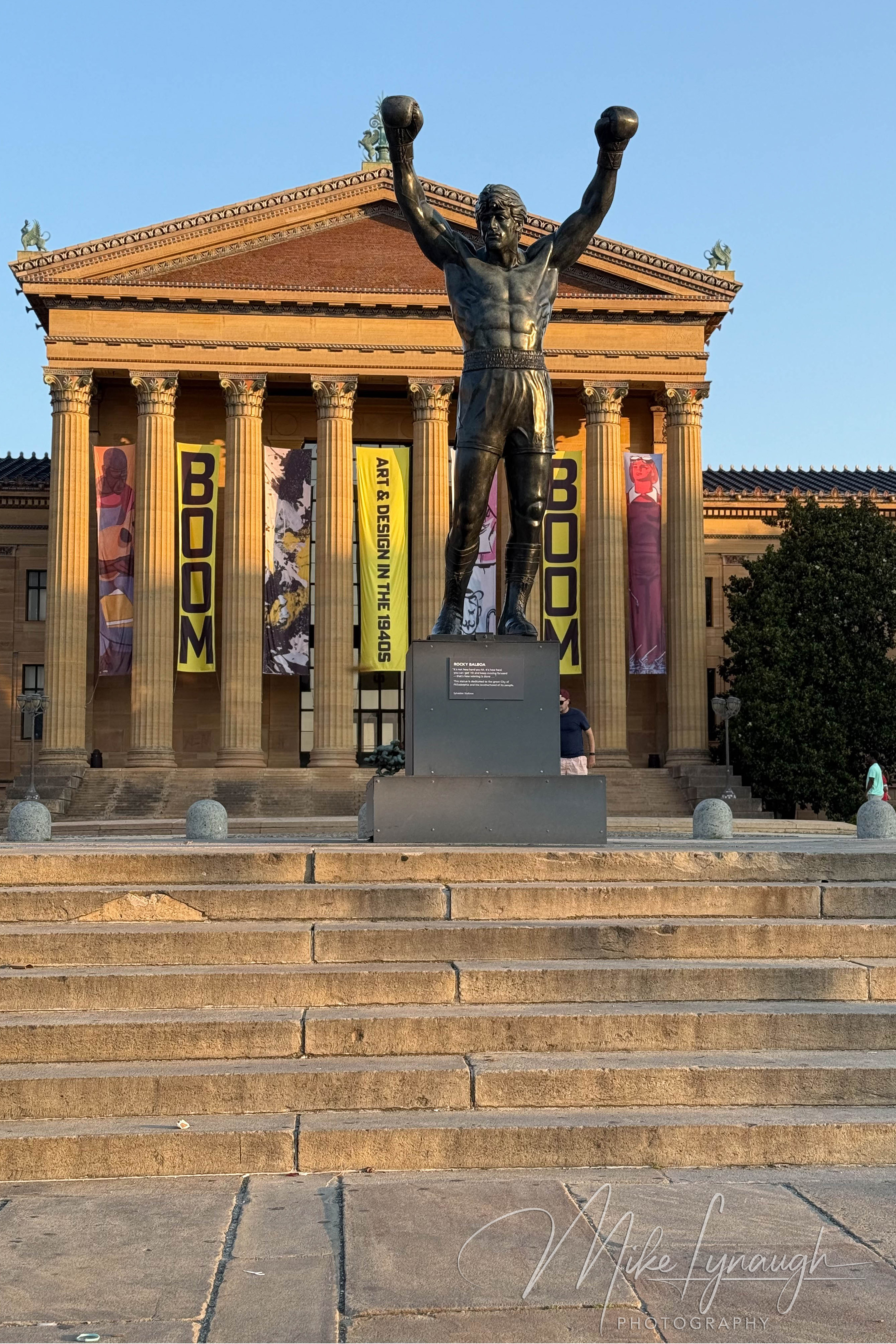 The Rocky Statue standing proudly at the top of the iconic Rocky Steps.