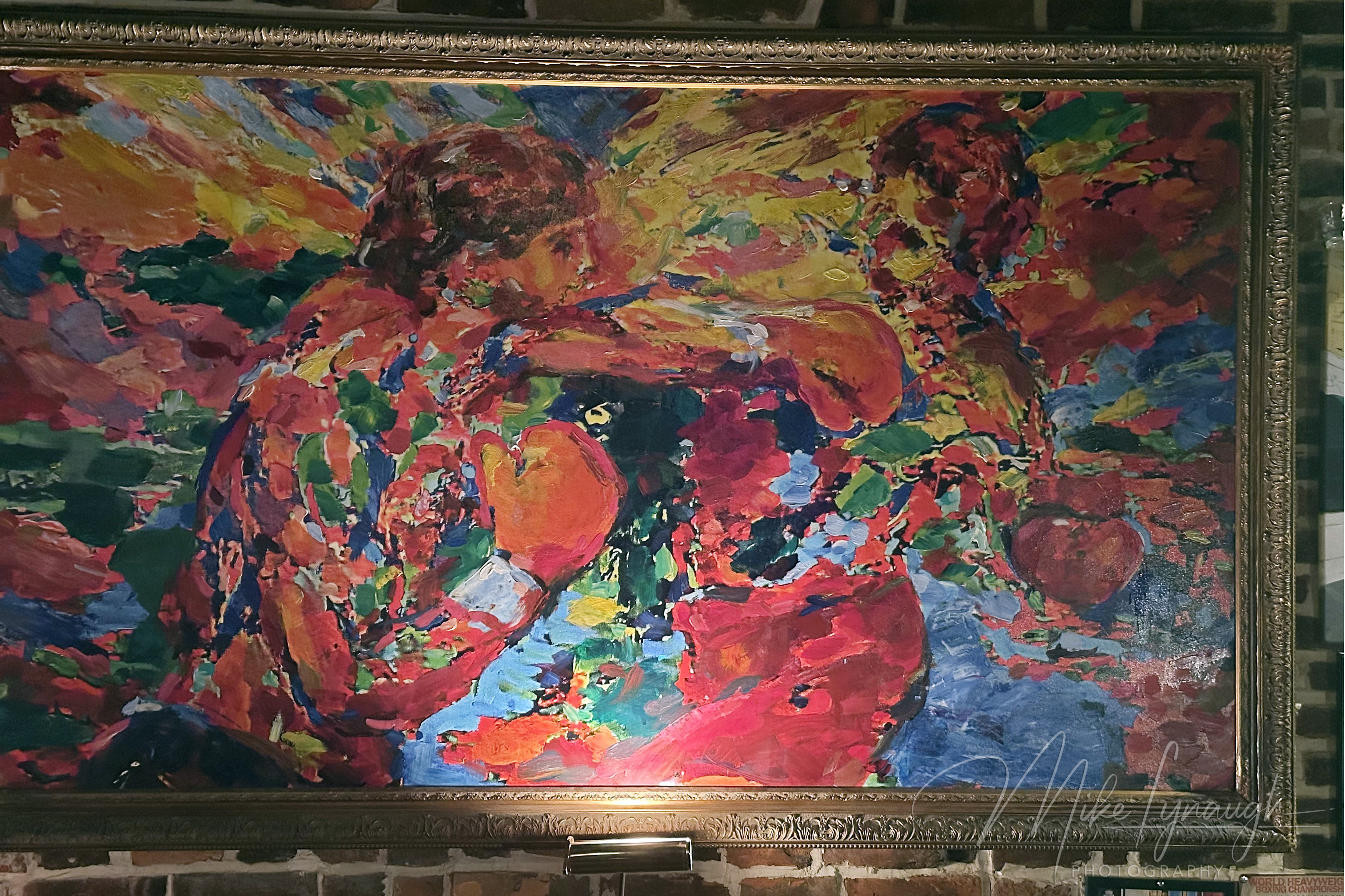 a reproduction of the famous painting by LeRoy Neimann from Rocky III on display upstairs at The Victor Cafe in South Philadelphia.