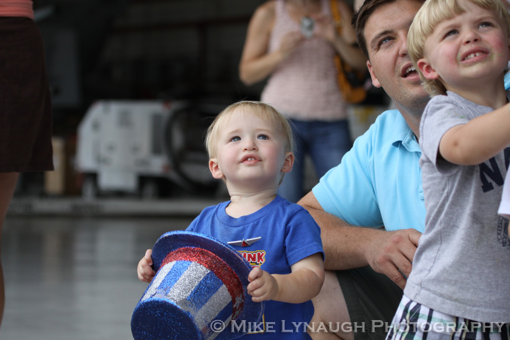 Family members and friends of the Aviators of VFA-83 "Rampagers" await their loved one's return home to Naval Air Station Oceana following a 7 month deployment in the Gulf on the USS Eisenhower on July 27, 2010.  � Mike Lynaugh
