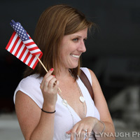 Family members and friends of the Aviators of VFA-83 "Rampagers" await their loved one's return home to Naval Air Station Oceana following a 6 month deployment in the Gulf on the USS Eisenhower on July 27, 2010.  � Mike Lynaugh