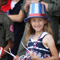 Family members and friends of the Aviators of VFA-83 "Rampagers" await their loved one's return home to Naval Air Station Oceana following a 6 month deployment in the Gulf on the USS Eisenhower on July 27, 2010.  � Mike Lynaugh