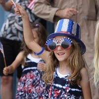 Family members and friends of the Aviators of VFA-83 "Rampagers" await their loved one's return home to Naval Air Station Oceana following a 6 month deployment in the Gulf on the USS Eisenhower on July 27, 2010.  � Mike Lynaugh