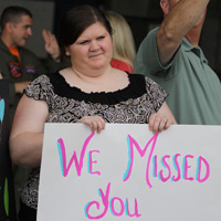 Family members and friends of the Aviators of VFA-83 "Rampagers" await their loved one's return home to Naval Air Station Oceana following a 6 month deployment in the Gulf on the USS Eisenhower on July 27, 2010.  � Mike Lynaugh