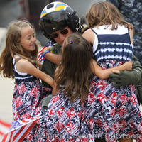 Aviators from VFA-83 "Rampagers" return home to Naval Air Station Oceana following a 6 month deployment in the Gulf on the USS Eisenhower on July 27, 2010.  � Mike Lynaugh