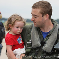 Aviators from VFA-83 "Rampagers" return home to Naval Air Station Oceana following a 6 month deployment in the Gulf on the USS Eisenhower on July 27, 2010.  � Mike Lynaugh