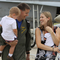 Aviators from VFA-83 "Rampagers" return home to Naval Air Station Oceana following a 6 month deployment in the Gulf on the USS Eisenhower on July 27, 2010.  � Mike Lynaugh