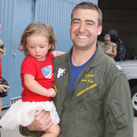 Aviators from VFA-83 "Rampagers" return home to Naval Air Station Oceana following a 6 month deployment in the Gulf on the USS Eisenhower on July 27, 2010.  � Mike Lynaugh
