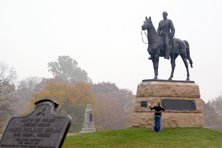 A couple enjoy their time together at the base of the General Meade Memorial   � Mike Lynaugh